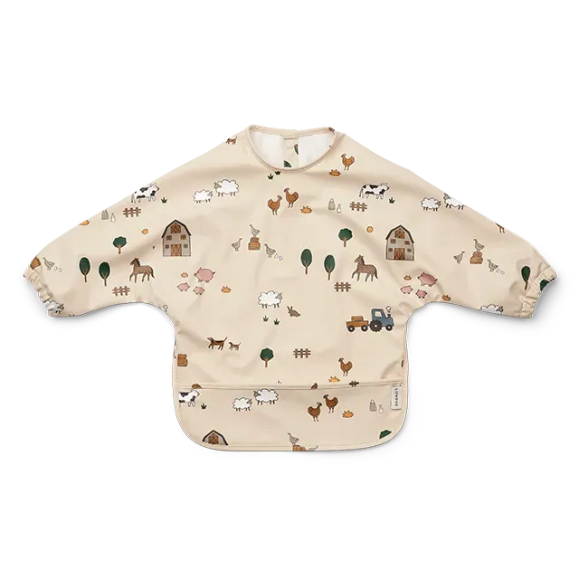 01_LW15084-1945 Liewood Merle Forklæde ærmer farm sandy.webp